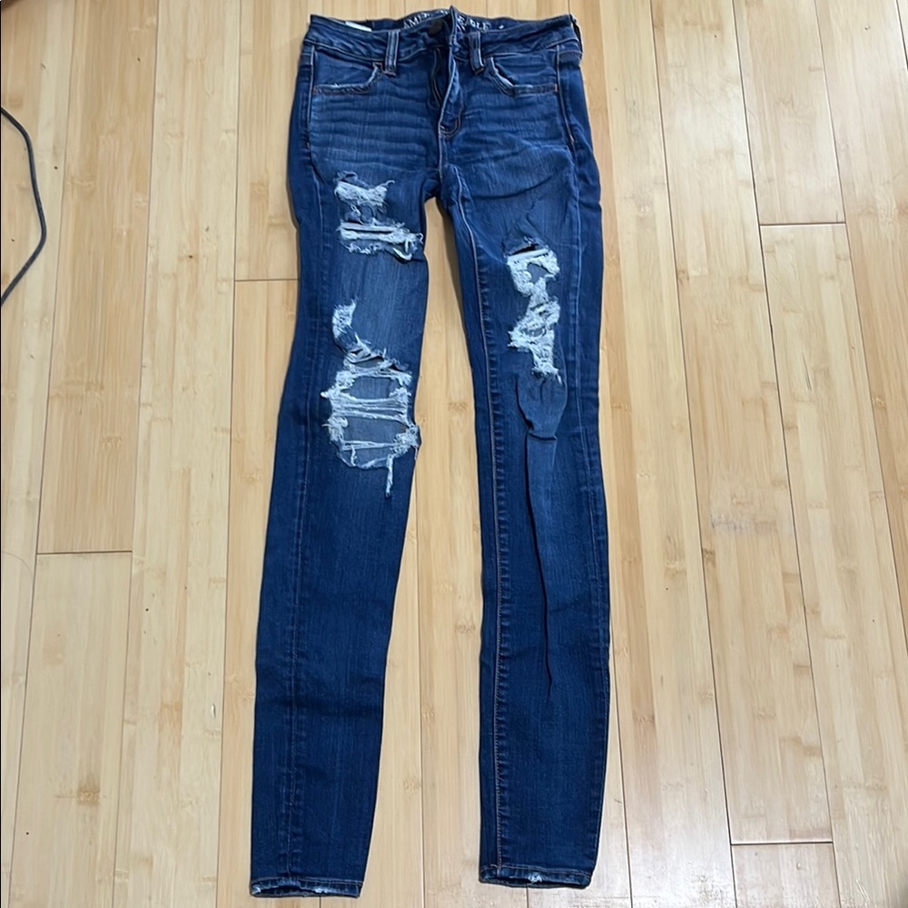 Distressed Blue Denim Jeans